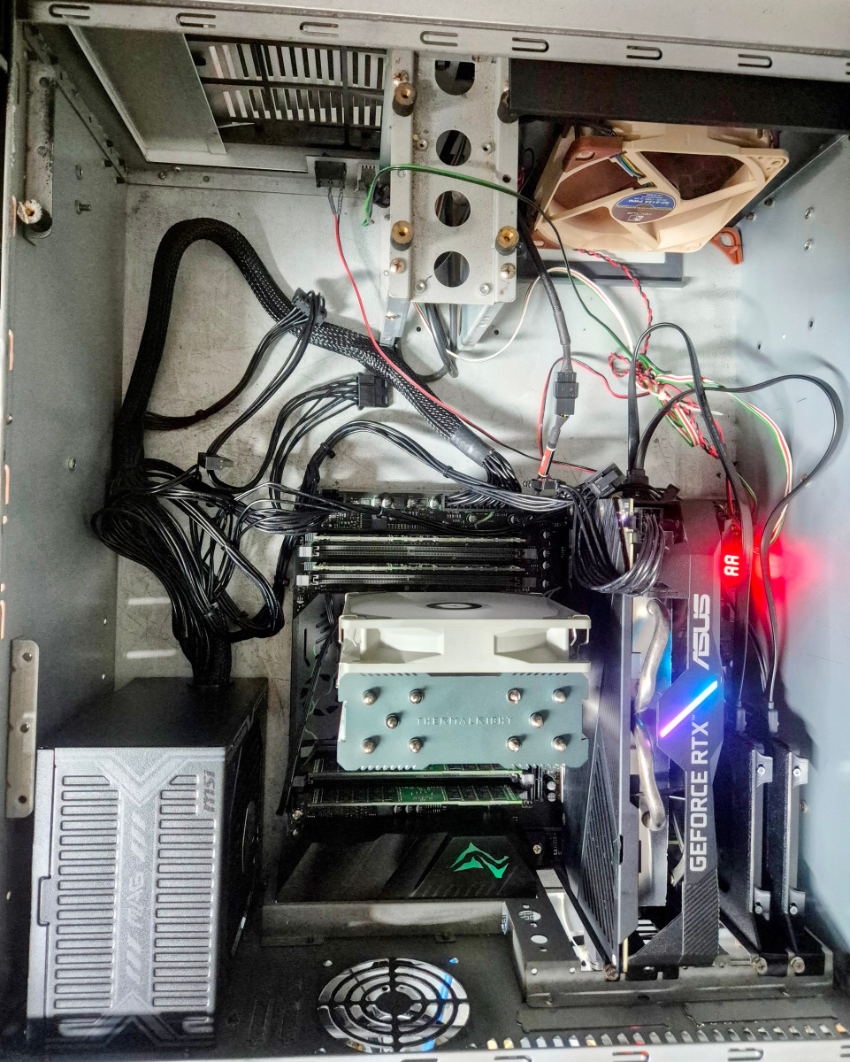 Inside the Galactica build, motherboard and GPU installed with no cable management