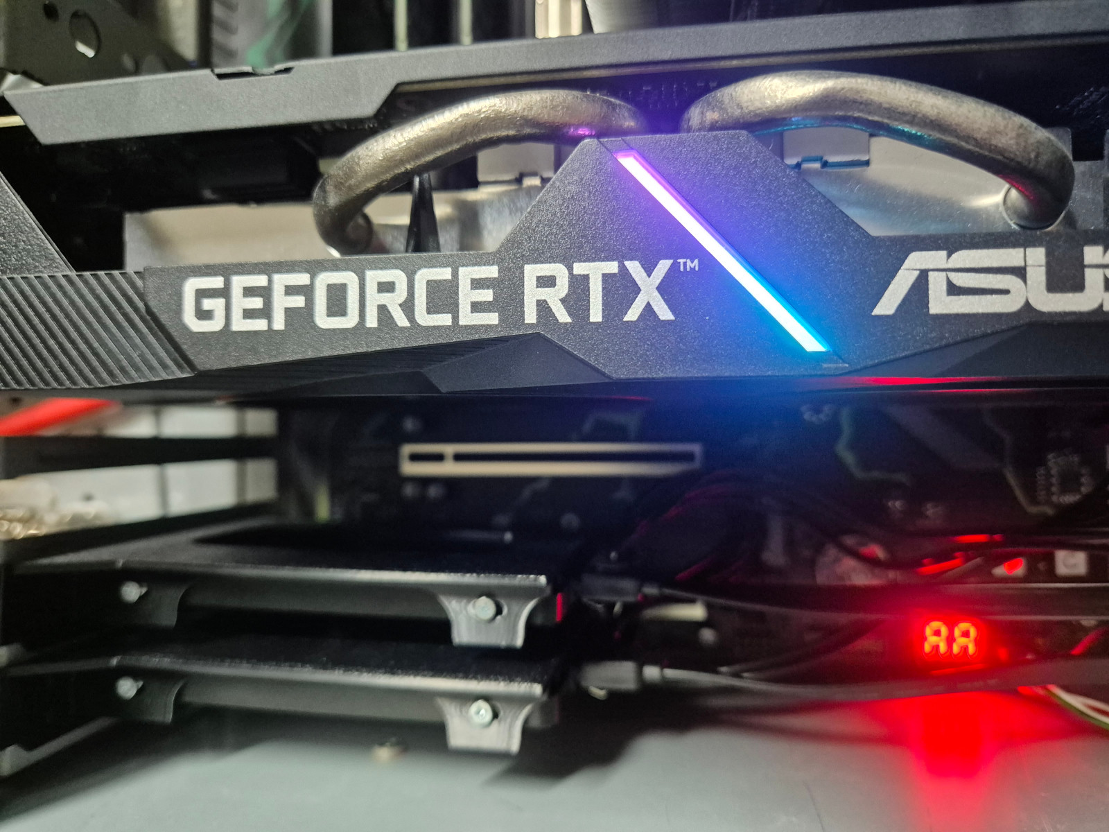 RTX 2060 Super GPU installed on the Machinist X99 motherboard with rear-mounted SSDs visible